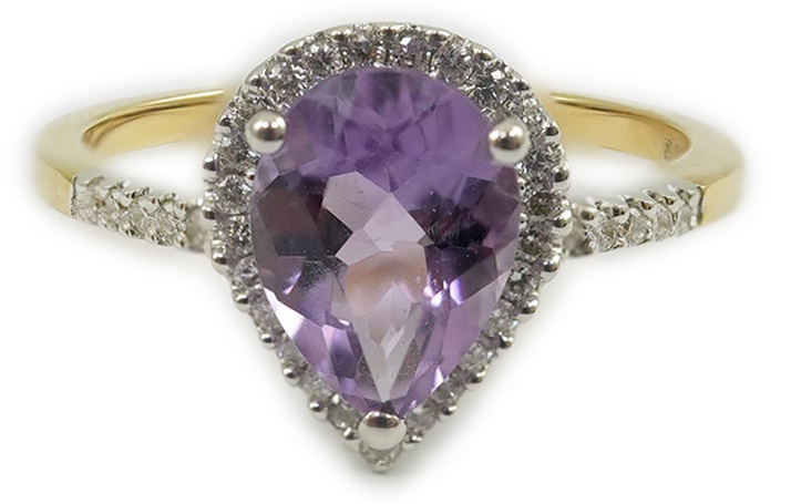 A modern 18ct gold and single stone pear cut amethyst set ring, with diamond chip set border and shoulders